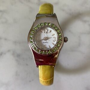 Avon Light Green Silvertone Hinge Cuff Watch with Crystal Detail